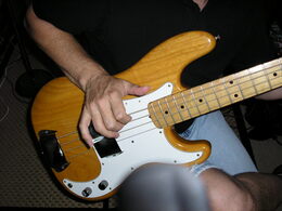 Tony Parker performs on his Fender bass during the recording of 